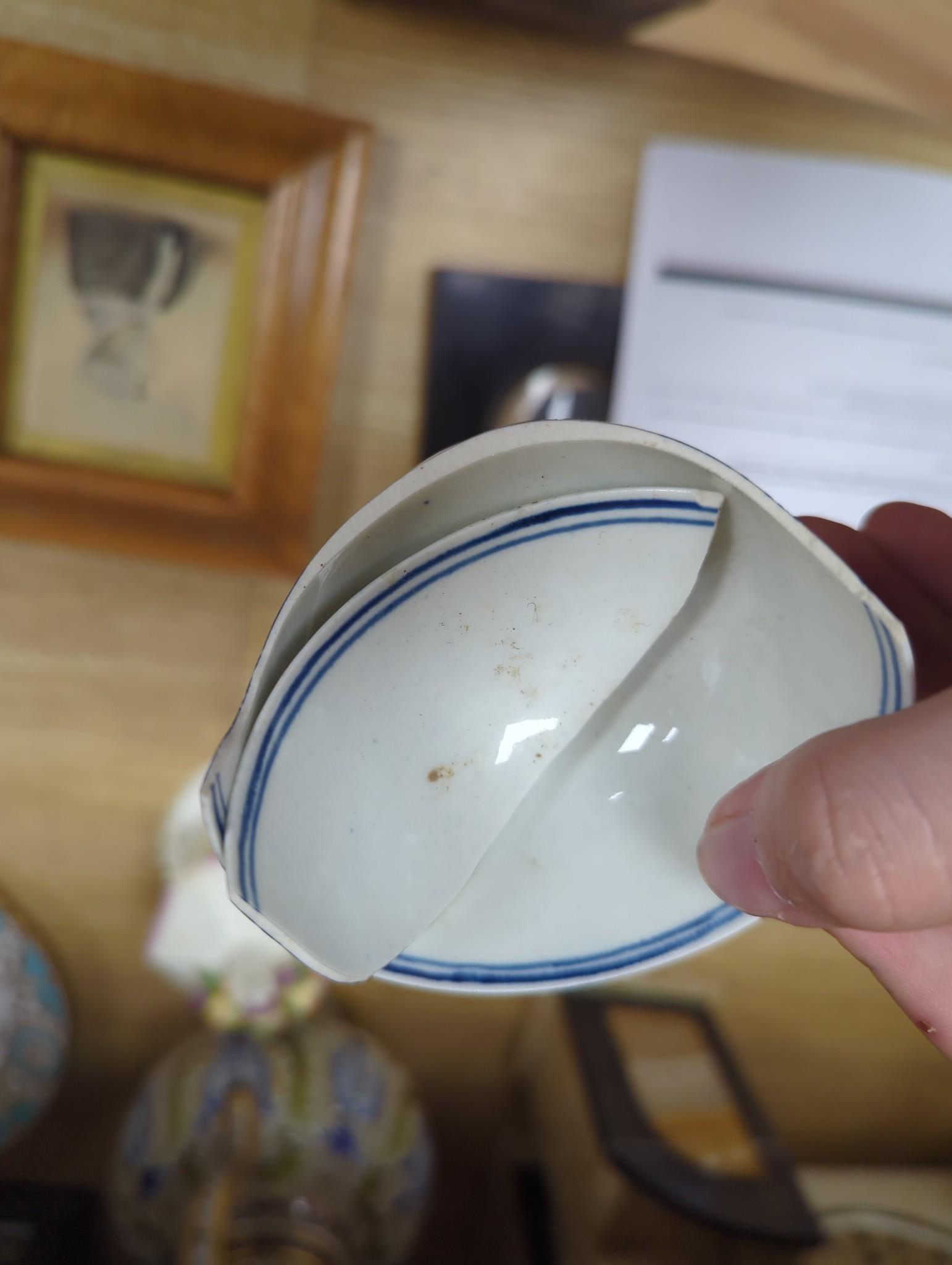 A large group of 18th century Worcester, Caughley and Liverpool blue and white tea bowls, coffee cups and saucers etc. including a Bow Cross-Legged Man